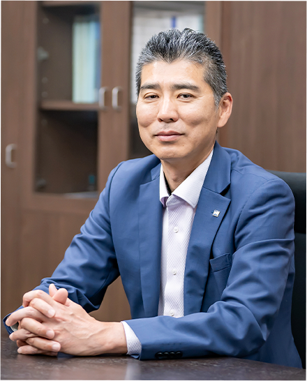 写真:代表取締役社長 尾刀 仁